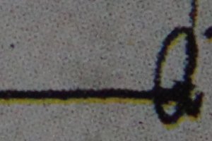 Diese als CMYK-Vierfarbdruck gedruckte Signatur zeigt deutlich einen gelben Blitzer